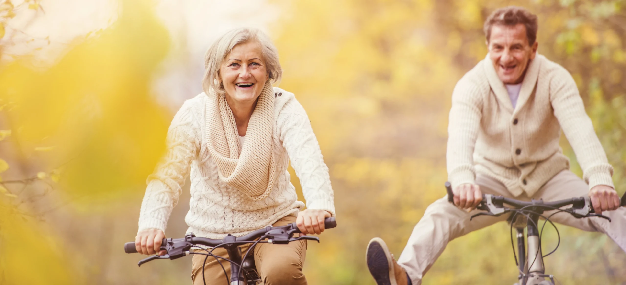 happy couple riding bikes