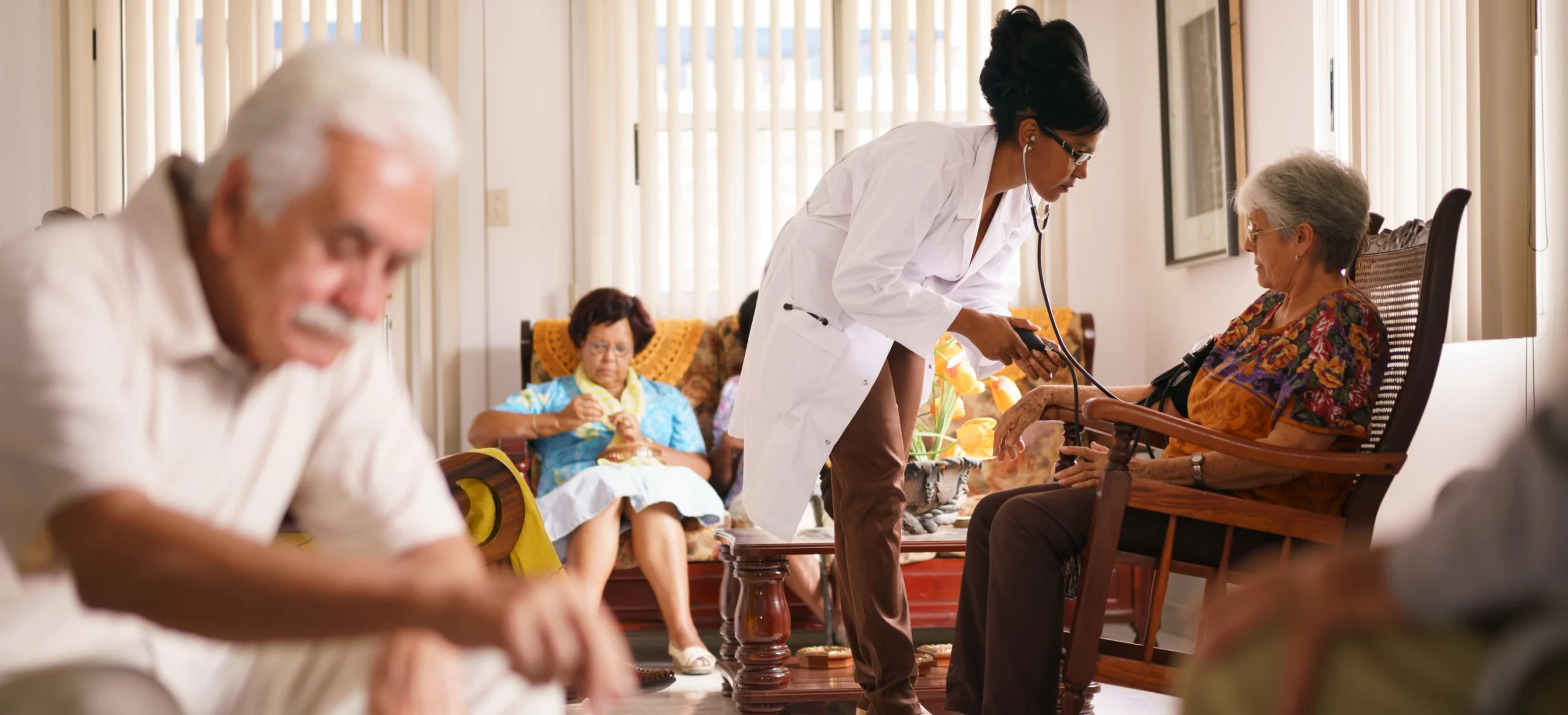 doctor measuring blood pressure